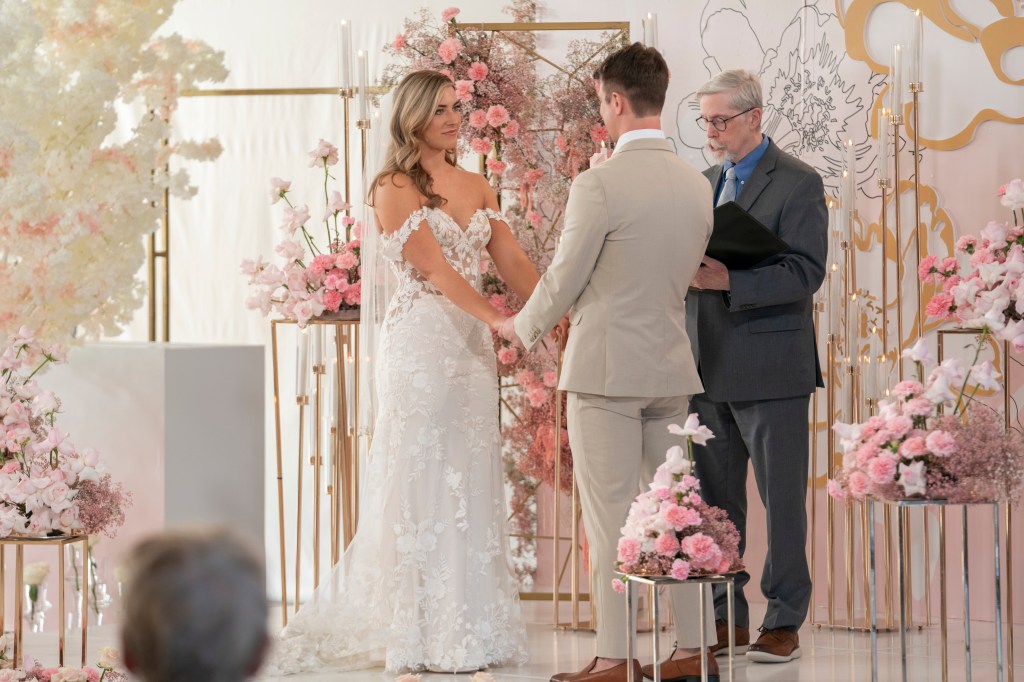 Sara Carlton and Ben Mezzinga on the altar